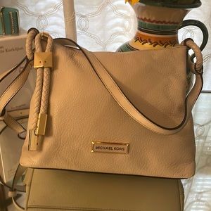Michael Kors crossbody bag. Stone colored pebbled leather. Excellent Condition.